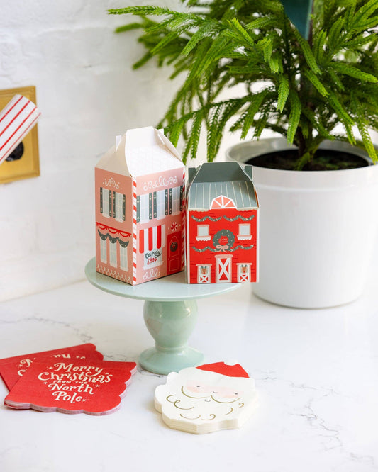 Festive advent boxes styled on a stand, perfect for Christmas treats and gifts across Canada.