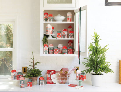 Christmas display featuring North Pole Advent Boxes styled as mini village houses, perfect for festive décor across Canada.