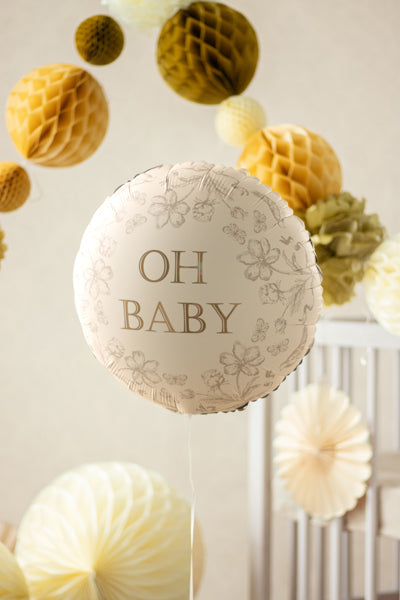 Oh Baby floral foil balloon styled with honeycomb decorations, ideal for Toronto baby showers.