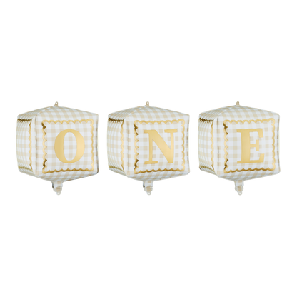 “ONE” cube foil balloons in neutral gingham with gold lettering, perfect for first birthday parties available at our Toronto party shop.