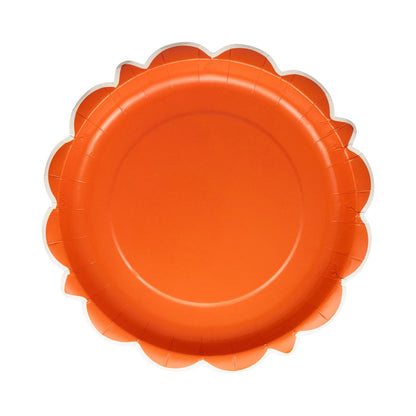 Scalloped paper plate with bold orange finish, available at our Toronto party shop for fall and Thanksgiving tables.
