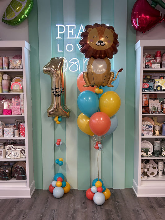 Party Animals Mini Kid Pop featuring a lion foil balloon, jumbo number balloon, and bright colourful balloons, available in Toronto