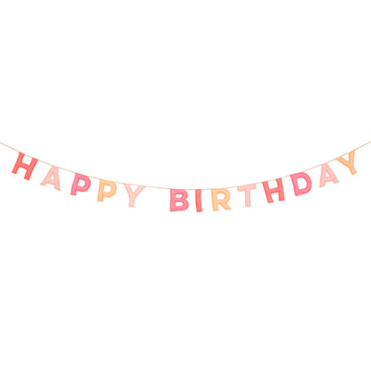 Full view of pastel felt Happy Birthday garland hanging on string