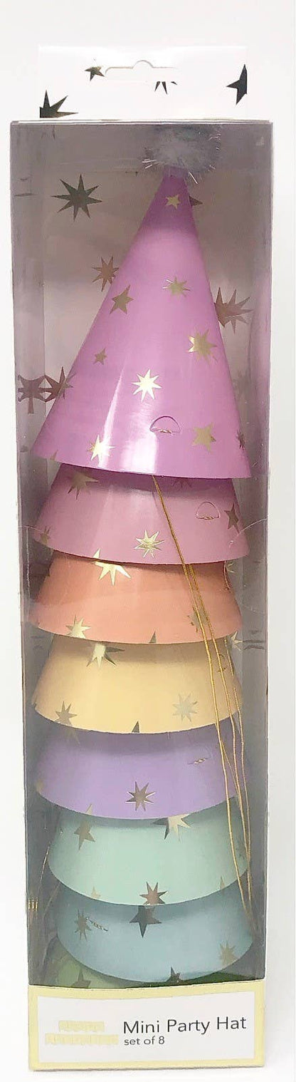 Set of colorful mini party hats in a box with star patterns.