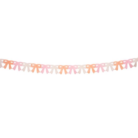 Paper bow garland in soft pastel shades of pink, peach, and cream, strung in a repeating pattern.