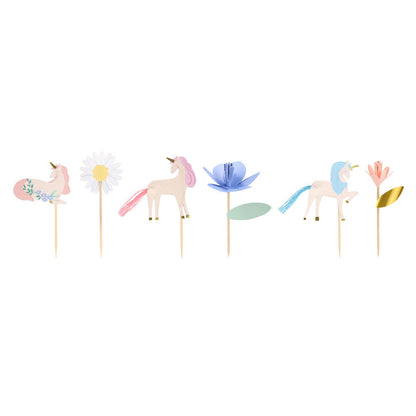 Pastel unicorn cupcake toppers from the Meri Meri Meadow Unicorn cupcake kit featuring floral and daisy details, available at our Toronto party shop.
