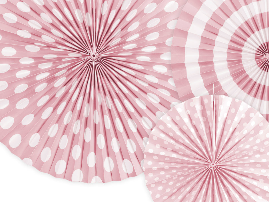 Close up of light pink paper rosettes with polka dot and stripe patterns available in Toronto and shipping across Canada