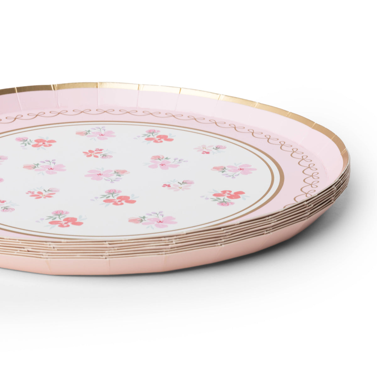 Stack of petal pink floral dessert plates with watercolour flowers and gold foil trim