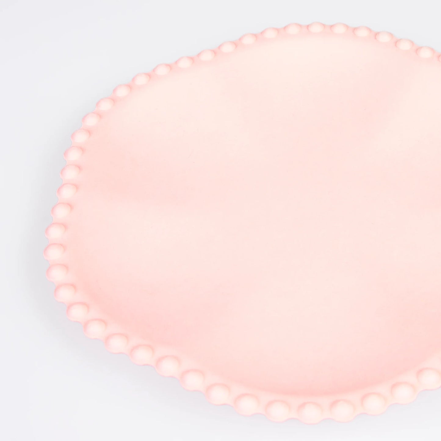 close up of pink dotted edge plate 