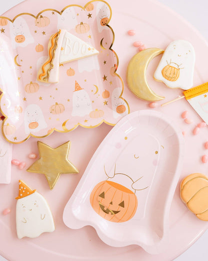 pink ghost shaped paper plates with cookies 