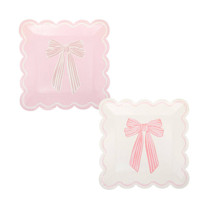 Pink and ivory scalloped plates with bow design, sold in Toronto at Confetti My Party 
