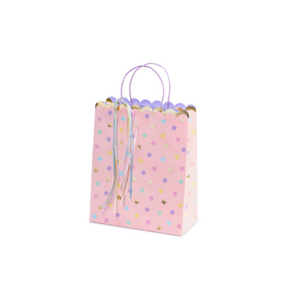 pink gift bag with multicoloured stars patteen
