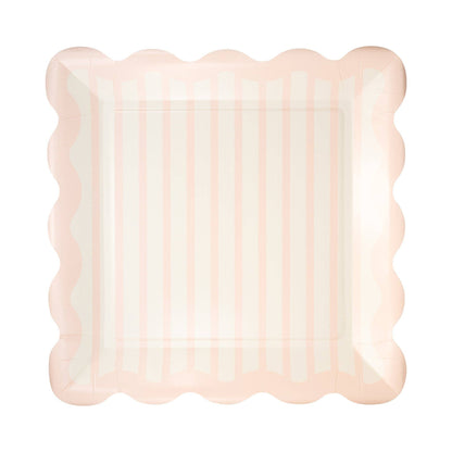 Pink striped scalloped plates styled at a baby shower table with matching party supplies available at our Toronto party shop.