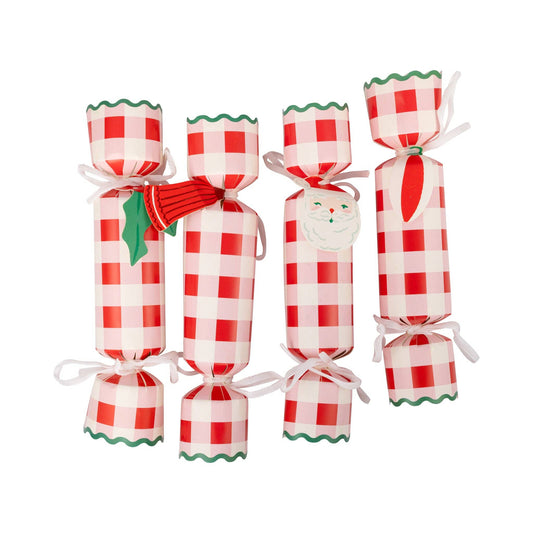 Red and pink plaid Christmas crackers with green trim, perfect for Toronto holiday parties and table décor.