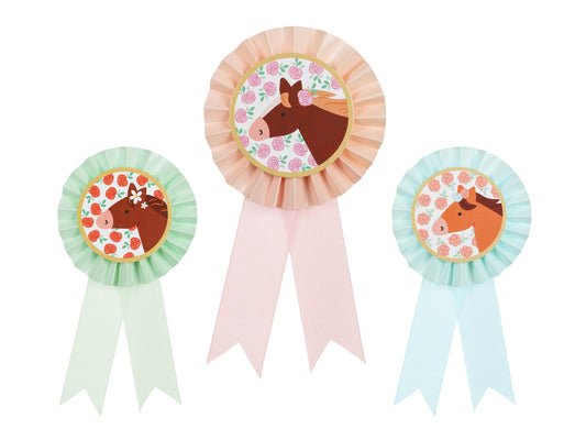 Set of three pastel pony rosette badges with ribbons, available at Confetti My Party Toronto