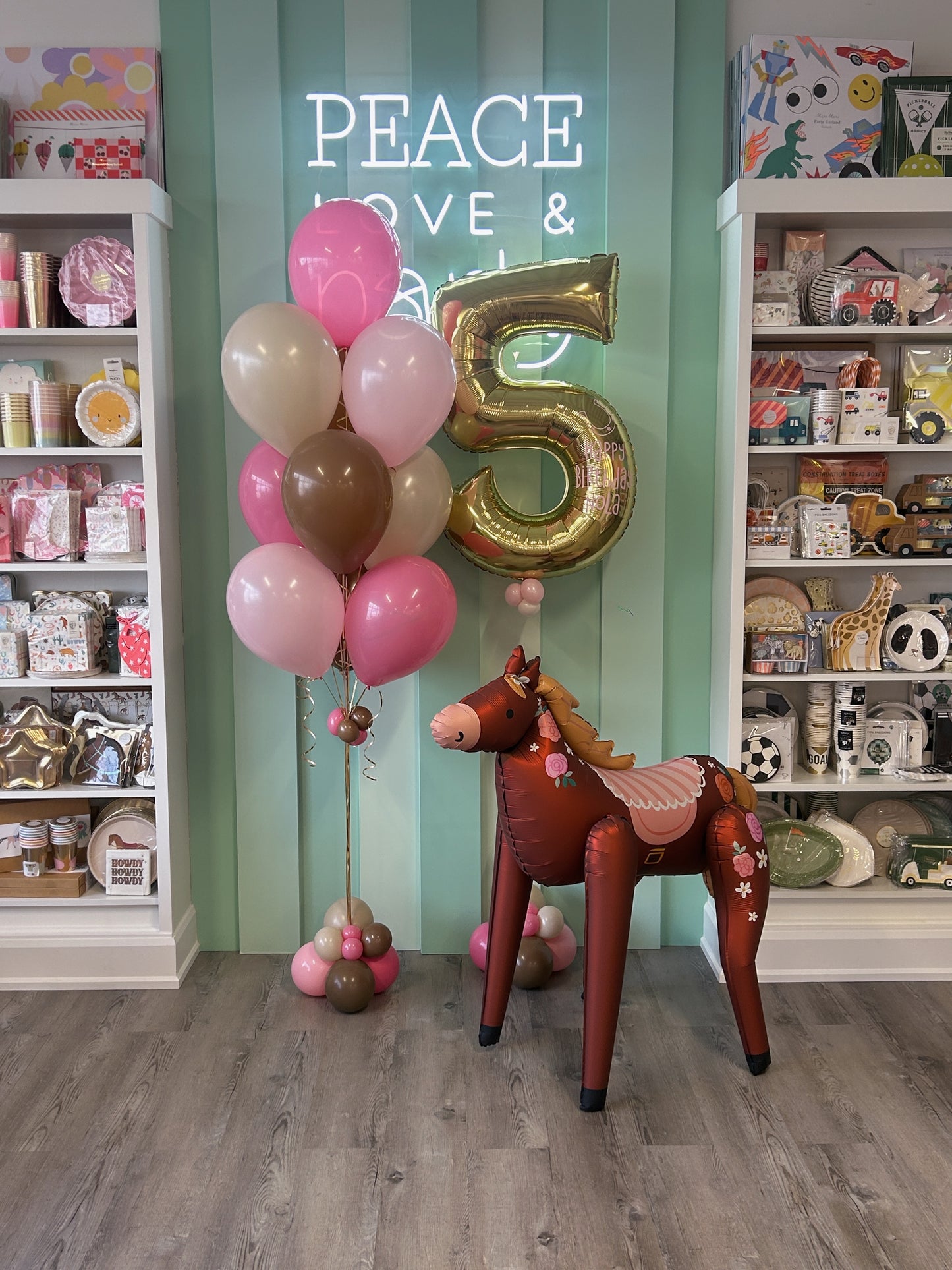 Pony-themed Mini Kid Pop balloon bundle with soft, colourful balloons and a floral pony foil balloon.