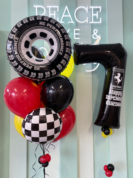Race Day Mini Kid Pop featuring a racing tire foil balloon with red, black, yellow, and checkered balloons, sold in Toronto at Confetti My Party