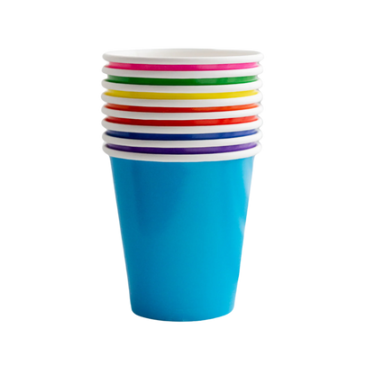 A stack of multicolored paper cups in various rainbow colors including pink, green, yellow, orange, and blue.