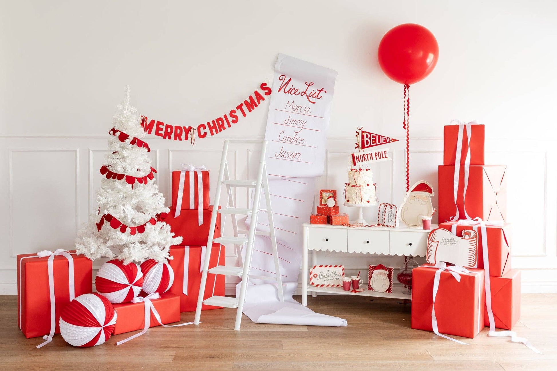 Red felt Merry Christmas banner, hanging on white wall decor for festive celebrations. Pick up in Toronto and ships Canada wide and USA.