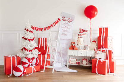 Red felt Merry Christmas banner, hanging on white wall decor for festive celebrations. Pick up in Toronto and ships Canada wide and USA.