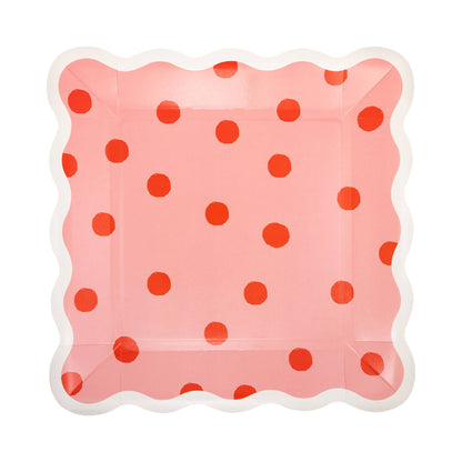 Pink scalloped Valentine paper plate with red polka dot pattern