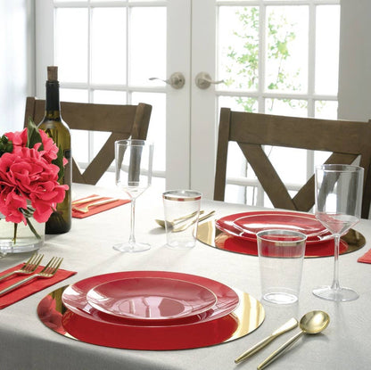 Red signature dinner and salad plates styled on a holiday table with gold accents and glassware, available at Confetti My Party Toronto. Ships Canada-wide and USA.