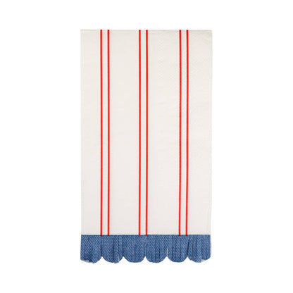 Striped dinner napkins with red vertical stripes and blue scalloped edge on a white background