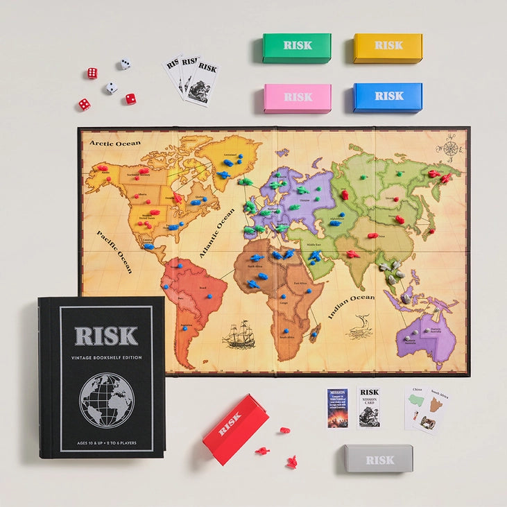 RISK game components: molded armies, mission cards, dice, available in Toronto at Confetti My Party and shipping across Canada and USA.