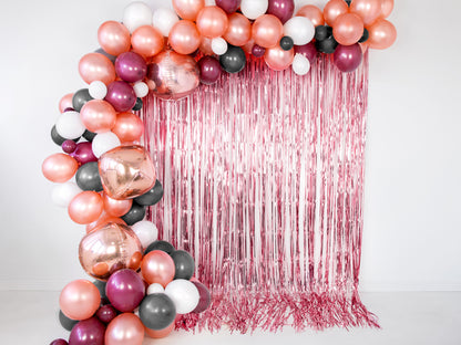 foil backdrop with balloon garland