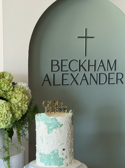 Sacrament event backdrop with sage oval panel and two white plinths with florals available in Toronto and shipping across Canada