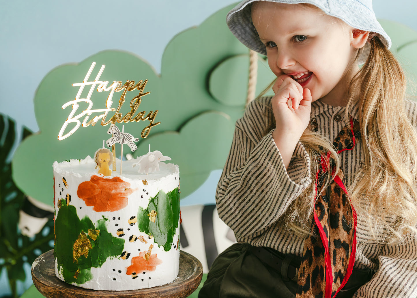 Safari animal birthday candles styled on a jungle birthday cake available in Toronto and shipping across Canada