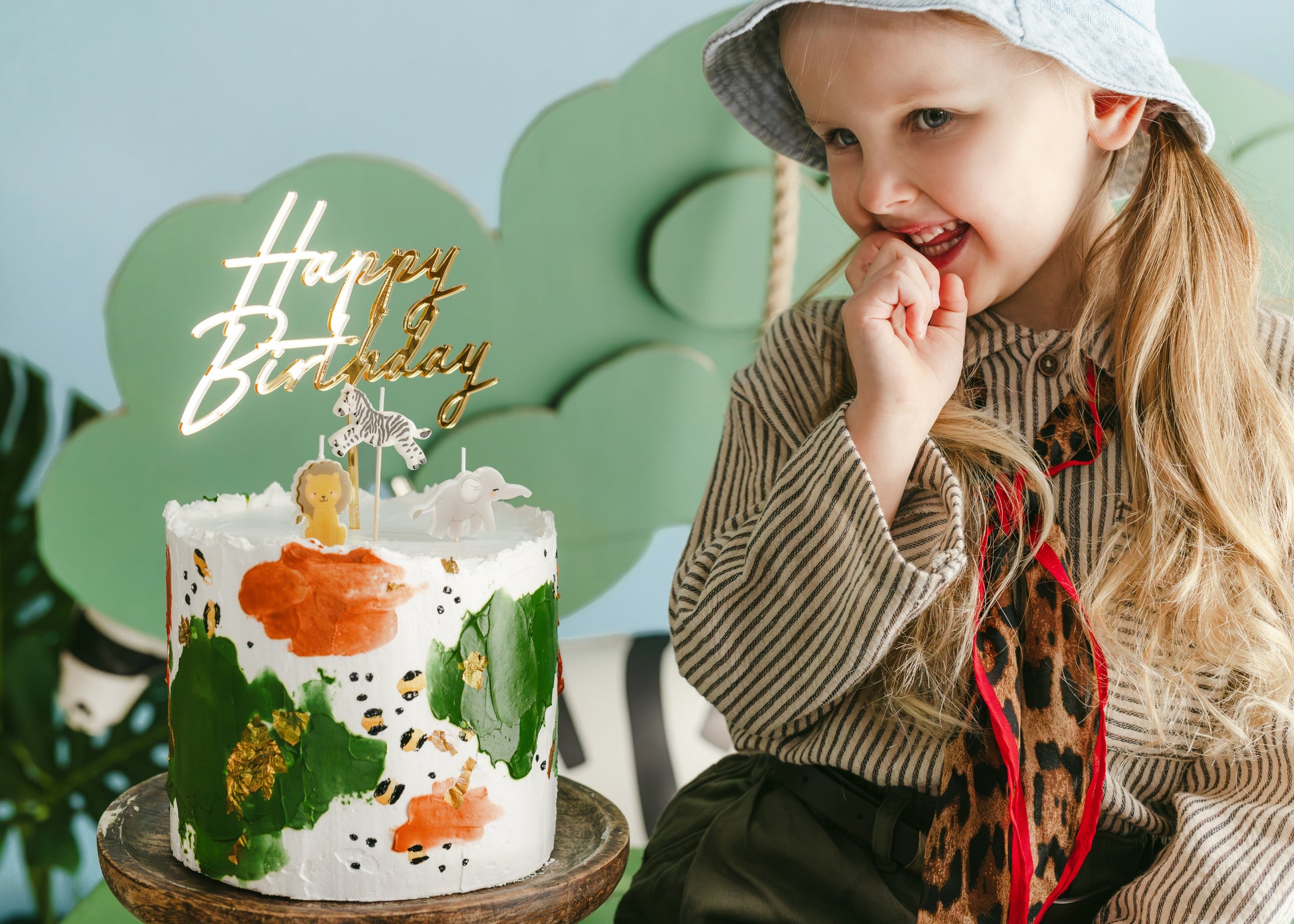 Safari animal birthday candles styled on a jungle birthday cake available in Toronto and shipping across Canada