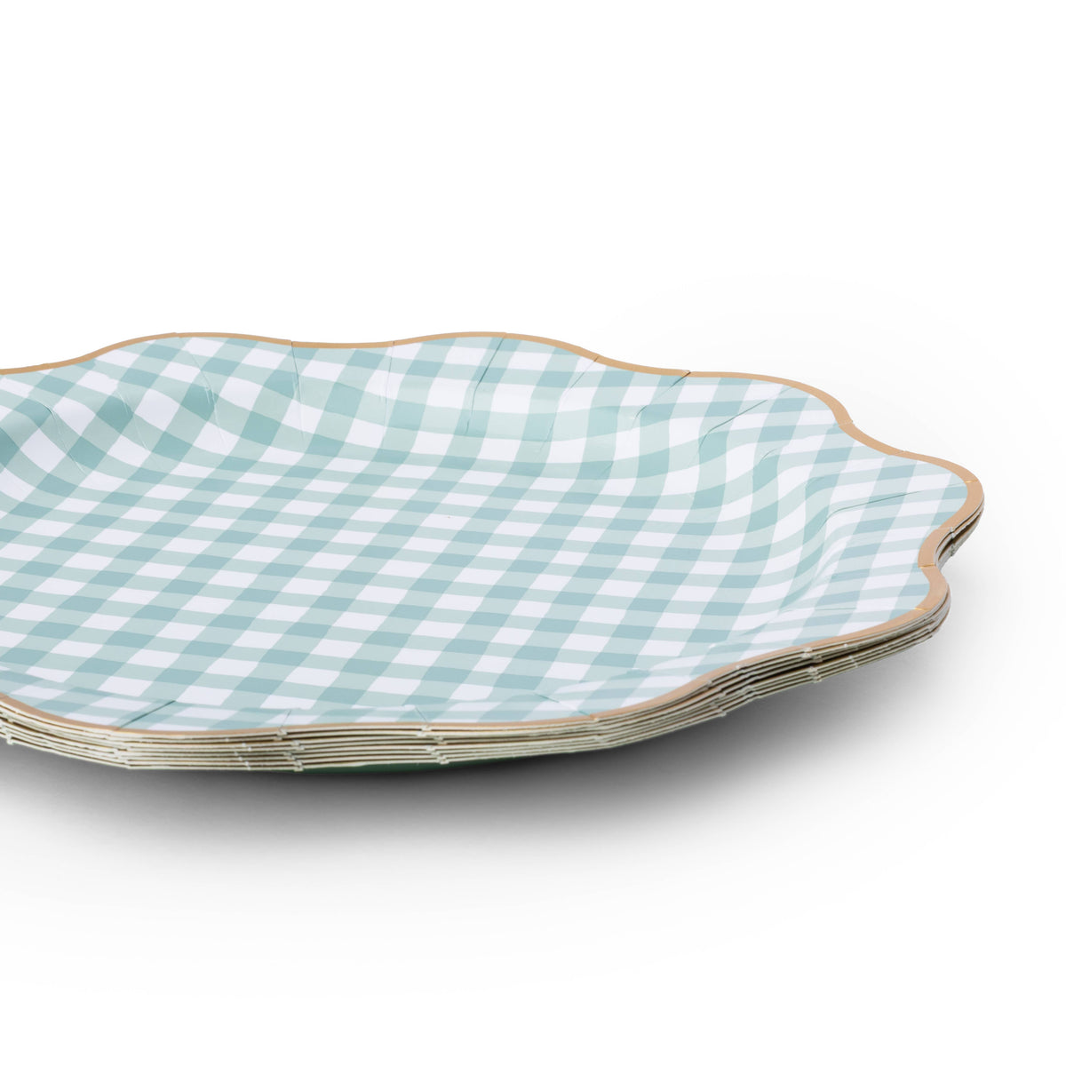 Stack of sage green gingham dinner plates with scalloped edges and gold foil trim.