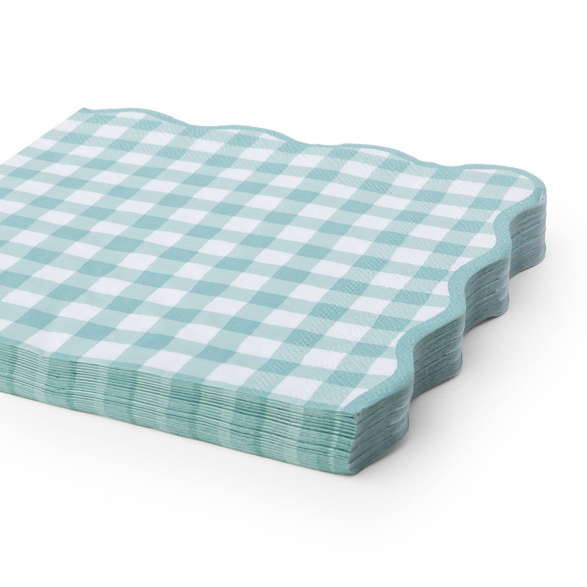 A stack of square paper napkins with a light sage and white gingham check pattern and scalloped edges, shown on a clean white background.
