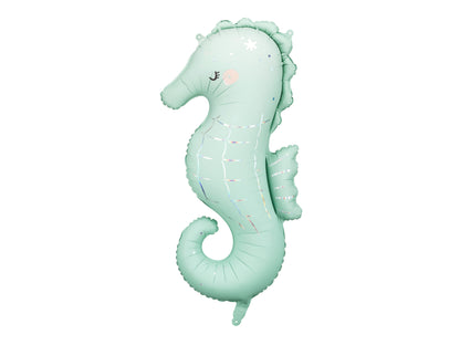 Mint green seahorse-shaped balloon on a white background