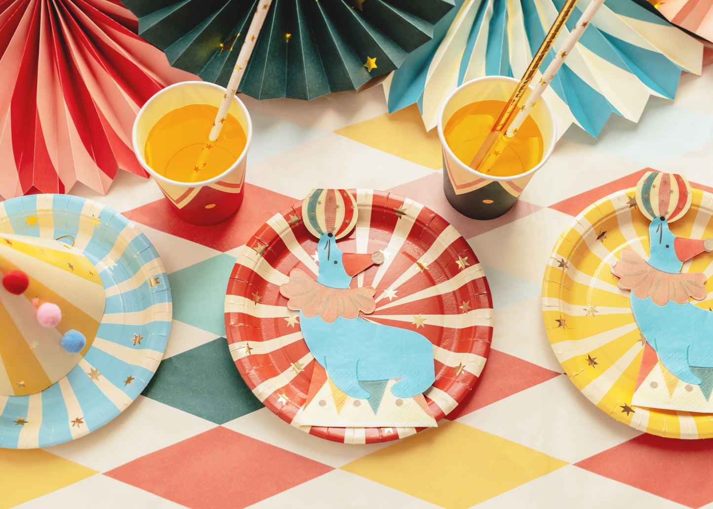 seal circus napkins on matching circus striped plates 