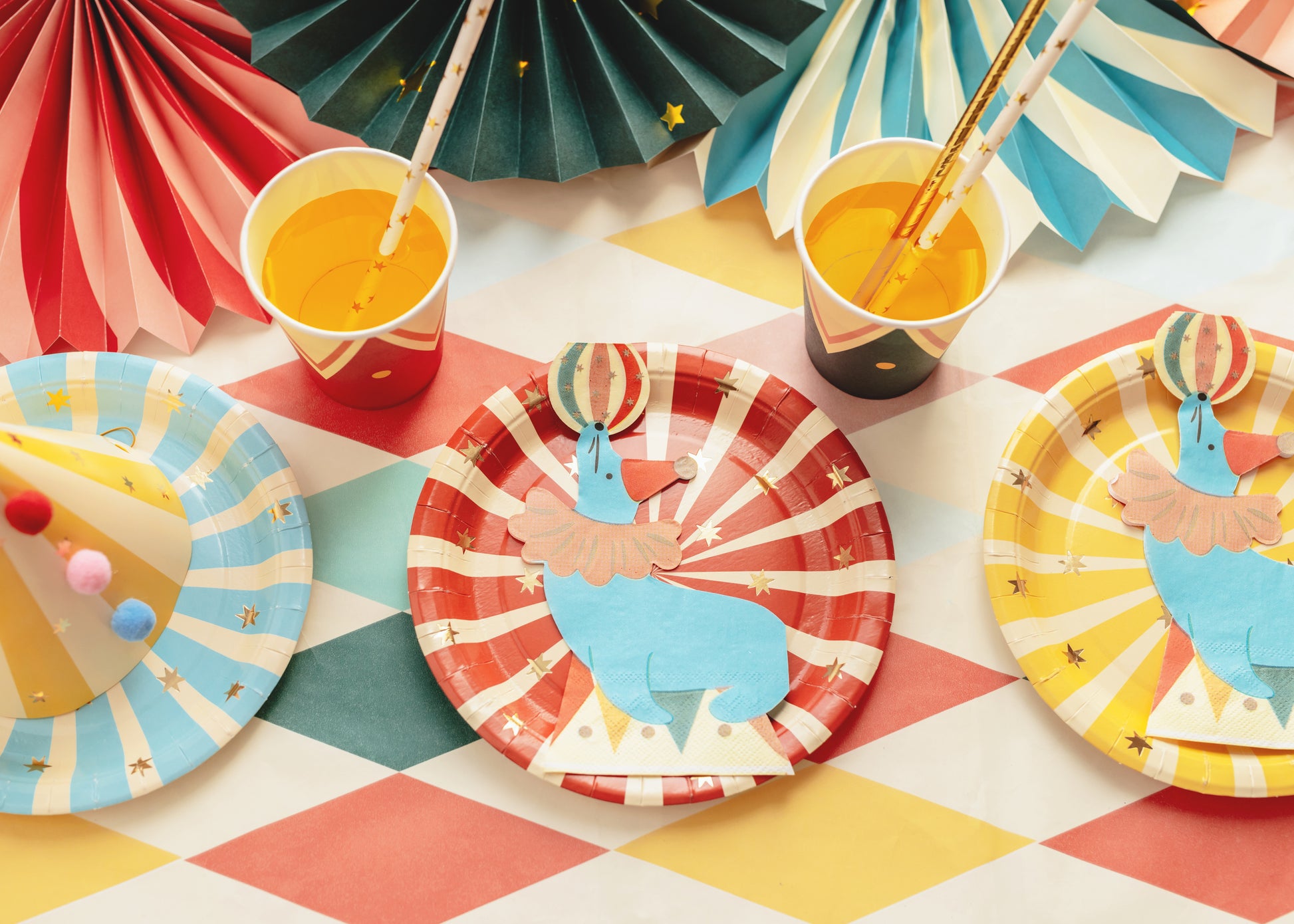 seal circus napkins on matching circus striped plates 