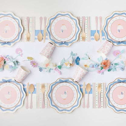 Goose themed party table with pink plates, pastel details and coordinated tableware, available in Toronto and shipping across Canada