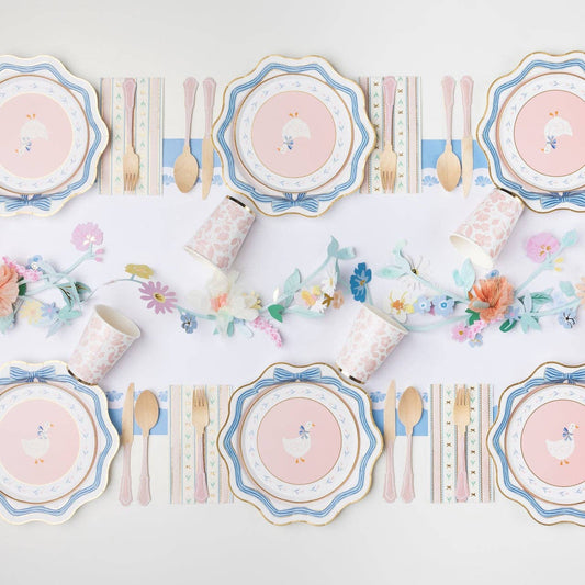 Goose themed party table with pink plates, pastel details and coordinated tableware, available in Toronto and shipping across Canada