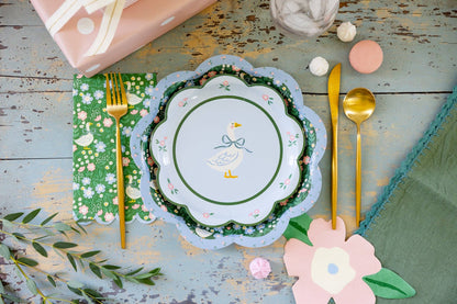 Silly goose scalloped dinner plates styled for an Easter table with pastel decor, sold in Toronto at Confetti My Party