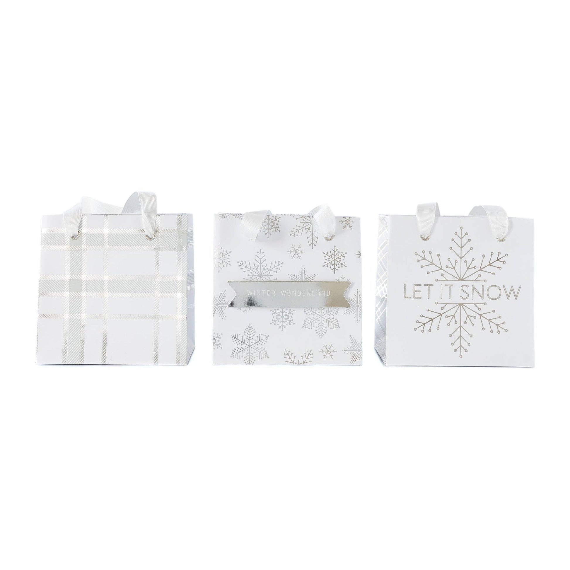 Three mini white holiday gift bags with snowflake designs. Pack of 6 in 3 designs (2 each). Pick up in Toronto and fast shipping in Canada.