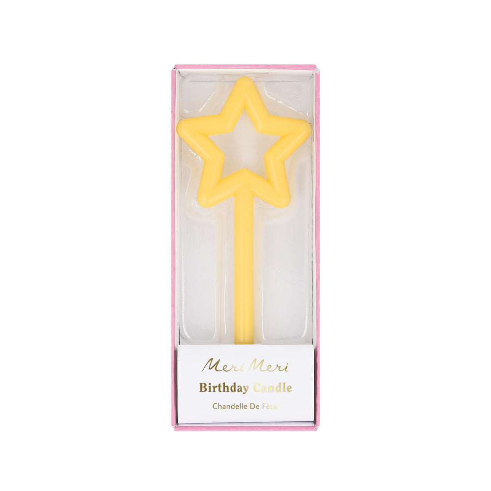 Yellow slim star candle by Meri Meri with long stick, available at Confetti My Party and ships across Canada for birthday cakes and parties.