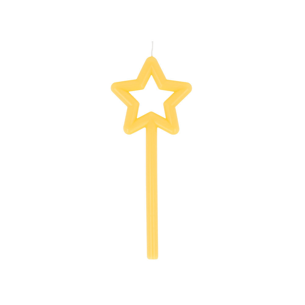 Yellow star-shaped candle on a white background