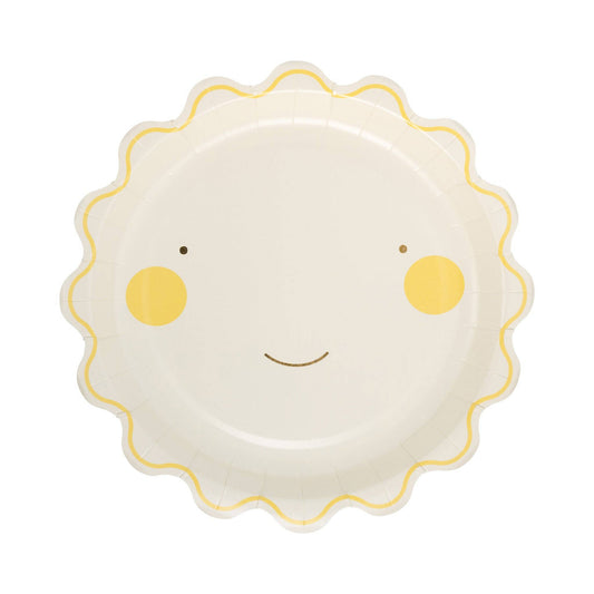 Round yellow smiling sun paper plate with scalloped edge, perfect for cheerful birthday parties in Toronto.