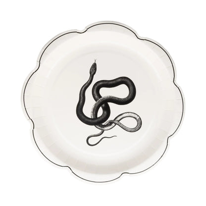 Decorative plate with a black snake design on a white background