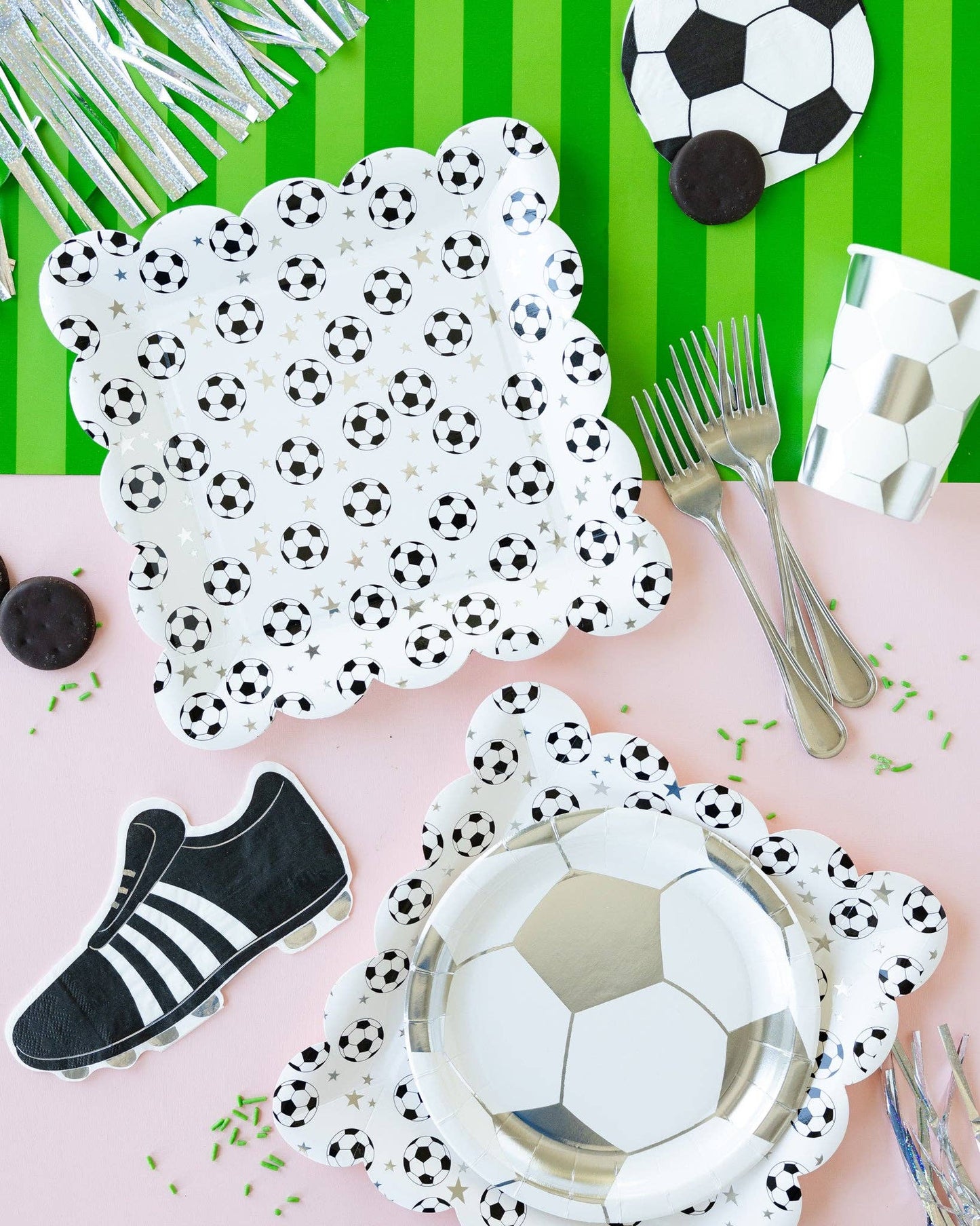 Soccer themed party table styled with scatter soccer ball dinner plates, available in Toronto
