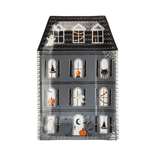 Spooky house shaped Halloween paper plates with ghosts, pumpkins, bats and black cat