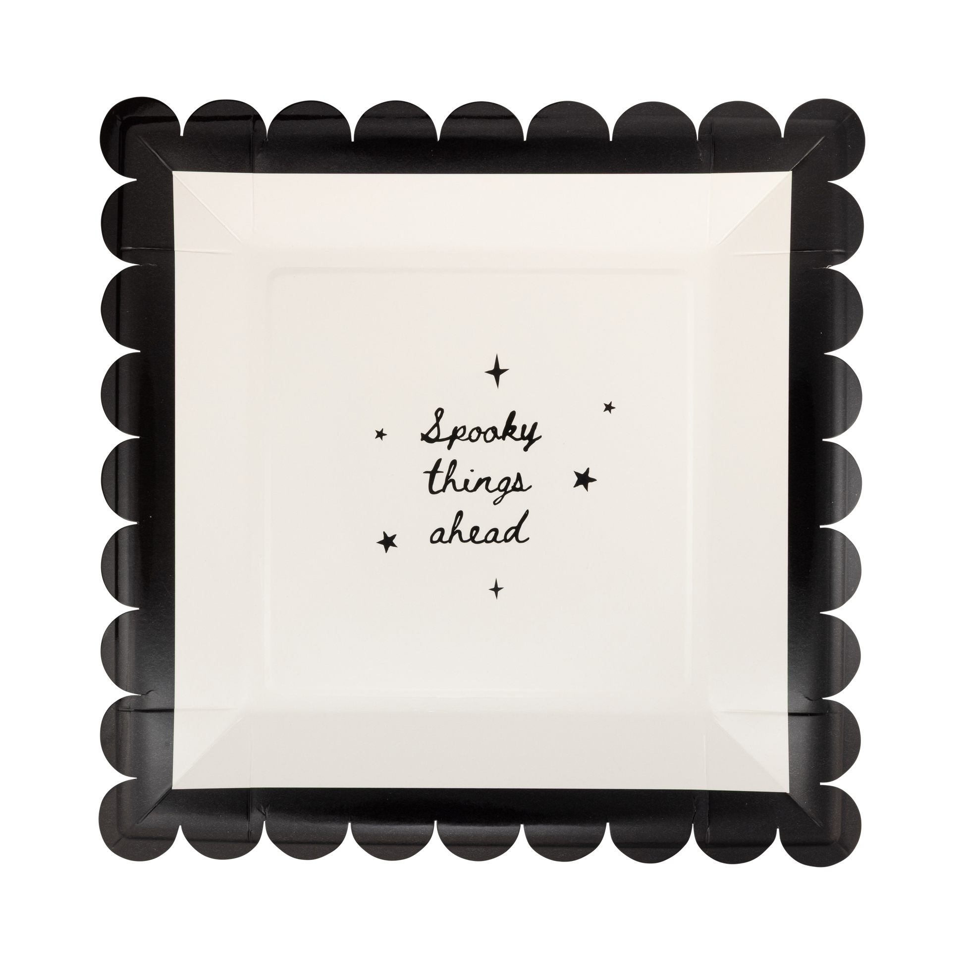 square paper plates with 'Spooky things ahead' text and black scalloped border on a white background
