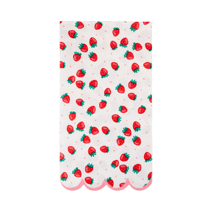 White napkin with red strawberry print and pink scalloped edge, perfect for summer parties in Toronto.