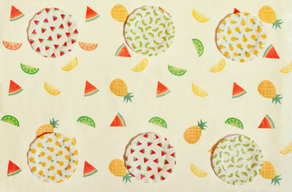 Summer fruit tablecover styled with coordinating fruit themed party plates available at our Toronto party shop